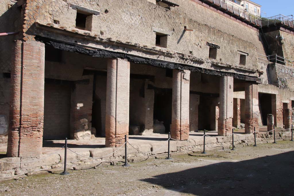 Decumanus Maximus, Herculaneum, October 2020.  
North side of Decumanus Maximus, with doorways numbered from 2 to 6, set under portico. Photo courtesy of Klaus Heese.
