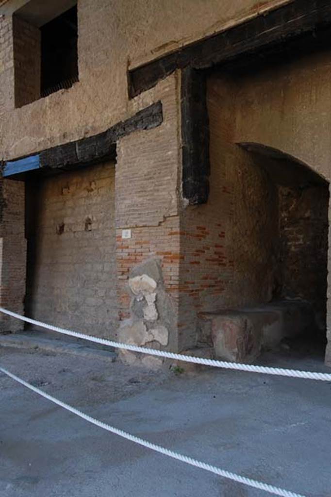 Decumanus Maximus, Herculaneum. May 2011. Looking towards west side of doorway, with bench outside of number 3.
Photo courtesy of Nicolas Monteix.

