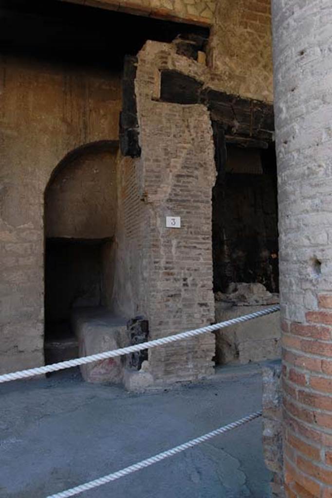 Decumanus Maximus, Herculaneum. May 2011.
Looking towards east side of doorway, with bench outside of number 3.
Photo courtesy of Nicolas Monteix.