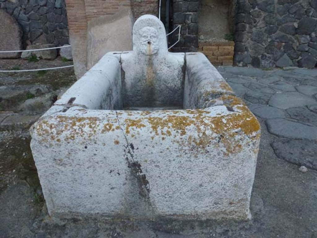 Decumanus Maximus, Herculaneum, October 2012. Fountain decorated with head of Hercules, from fountain on east end of the Decumanus Maximus. Photo courtesy of Michael Binns.