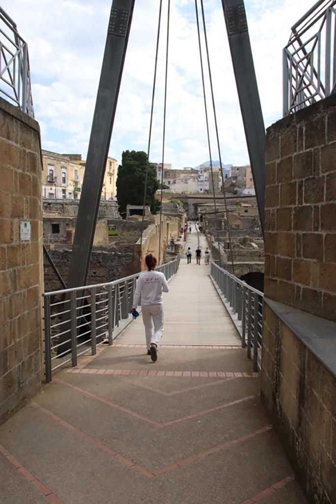 Herculaneum, May 2024.
Looking north across access bridge towards roadway known as Cardo III Inferiore.
Photo courtesy of Klaus Heese.