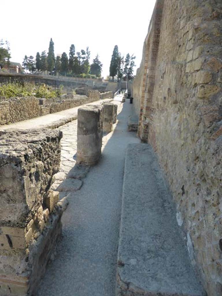 II.2 Herculaneum, September 2015. Looking south on Cardo III Inferiore towards doorway with benches on either side of it.