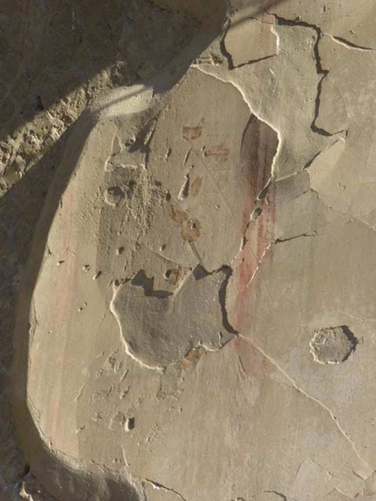 II.2 Herculaneum, September 2015. Remaining painted plaster on east wall.