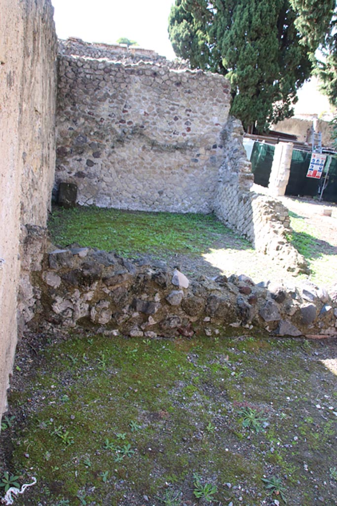 II.4 Herculaneum, October 2022. Lower, remains of room on south side of shop. 
The upper part of the photo is a room in II.3. Photo courtesy of Klaus Heese.

