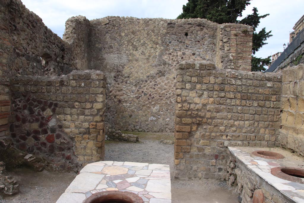 II.6/7 Herculaneum, May 2024. Looking towards doorway in south wall into two rear rooms. Photo courtesy of Klaus Heese.