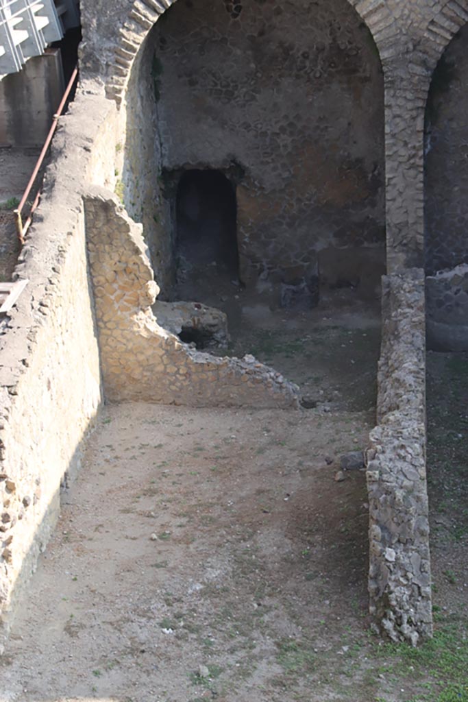 III.1/2/18/19, Herculaneum, October 2023.
Looking north from access roadway towards area of rooms G, H, I, L, M, on west side of lower floor.
Photo courtesy of Klaus Heese.