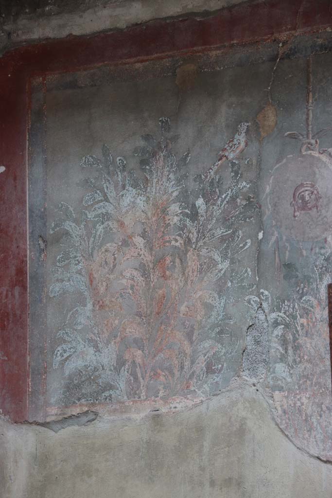 III.3, Herculaneum, September 2017. East end of garden painting on south wall above nymphaeum. 
Photo courtesy of Klaus Heese. 
