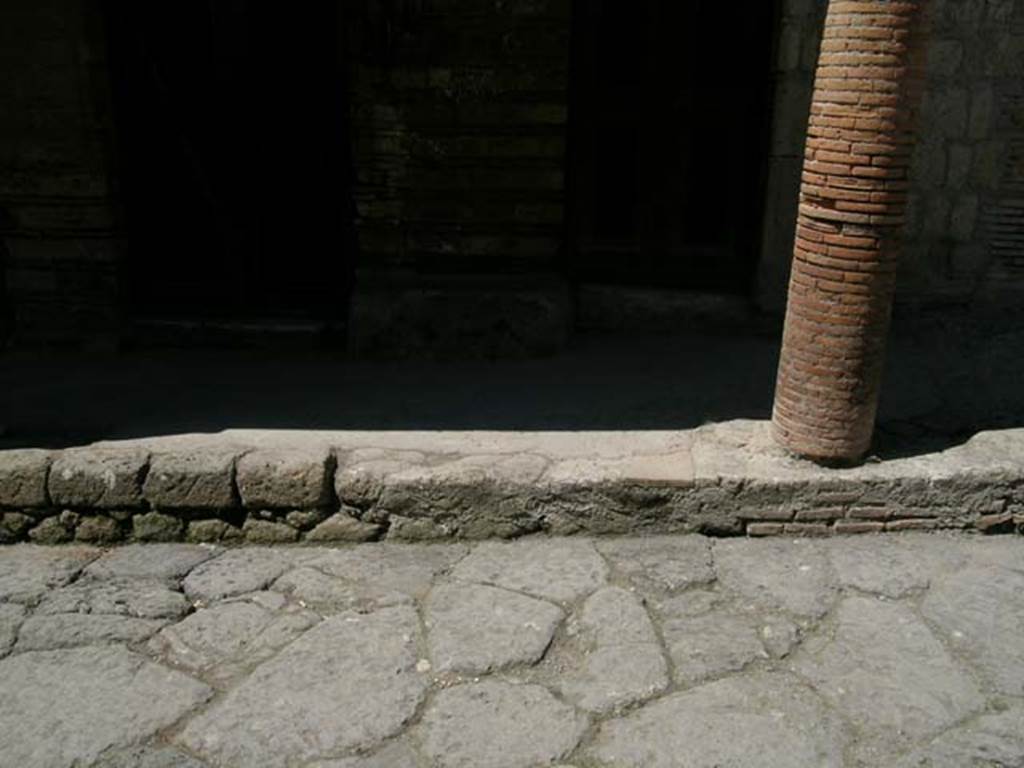 III.15/14/13, Herculaneum. April 2005.
Looking west towards masonry column at northern end of balcony, and doorways at III.14 and III.13.
Photo courtesy of Nicolas Monteix.
