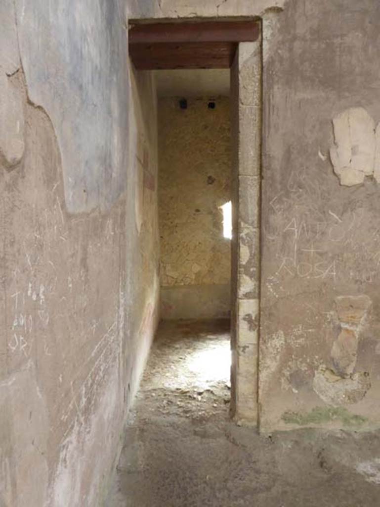 III.16, Herculaneum, October 2014. Room 9, doorway in north-east corner of atrium leading to room 3.  Photo courtesy of Michael Binns.
