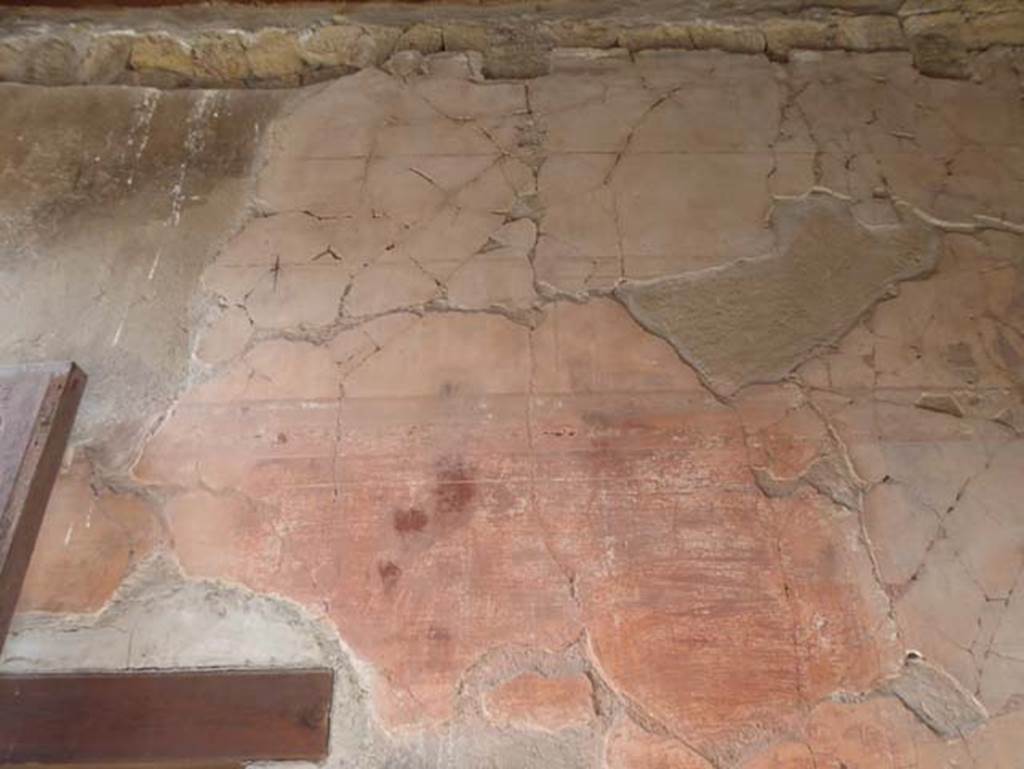 III 16, Herculaneum, October 2014. Room 1, south wall with remains of painted stucco, and doorway to room 2. Photo courtesy of Michael Binns.