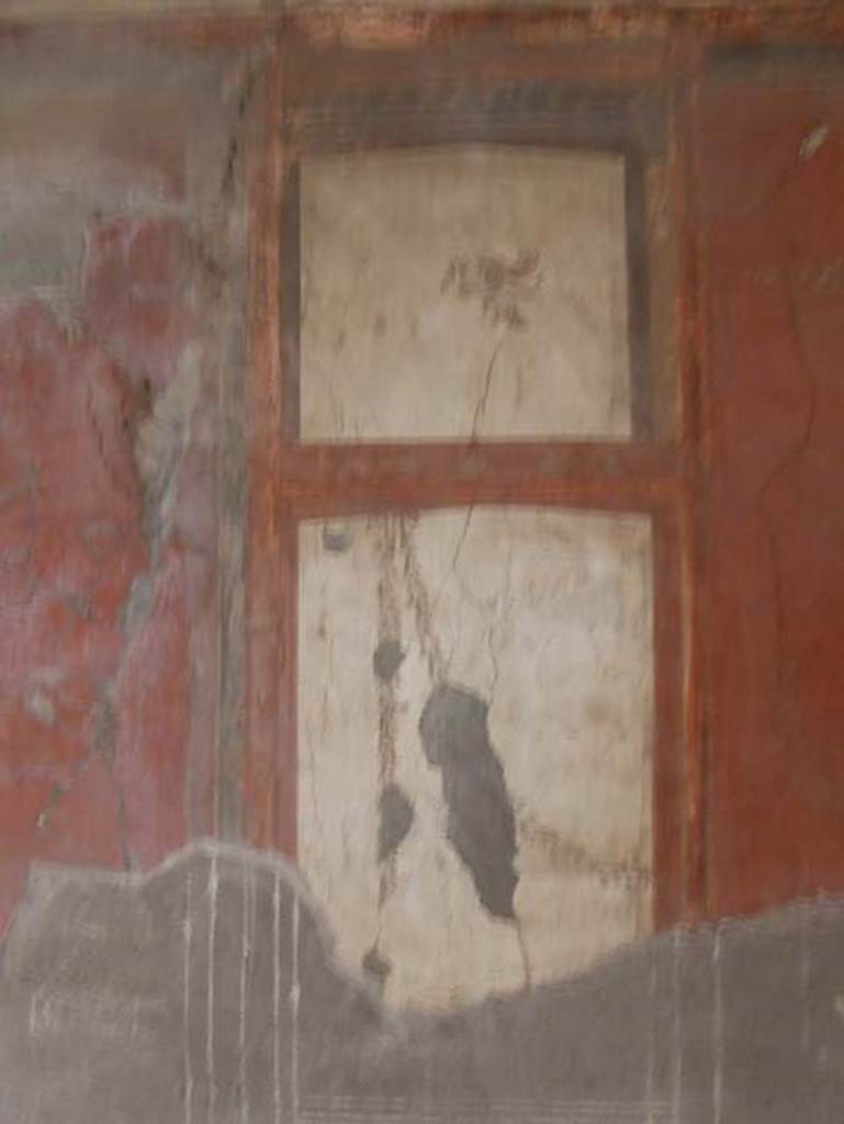 IV.2/1, Herculaneum, September 2016. Room 11, detail from west wall. Photo courtesy of Michael Binns.