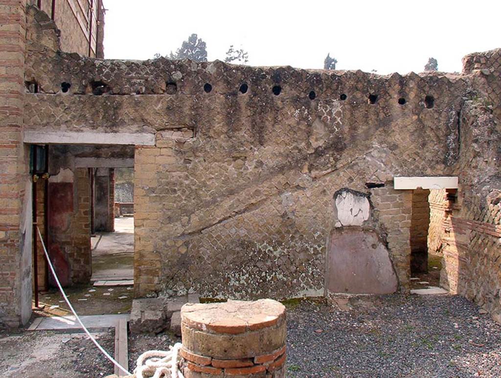 IV.1/2 Herculaneum. May 2019. South wall of peristyle in south-west corner. Photo courtesy of Domenico Camardo.
The doorway on the left leading across corridor 20, and across room 17, towards the terrace.
The doorway on the right leading into corridor 20.
