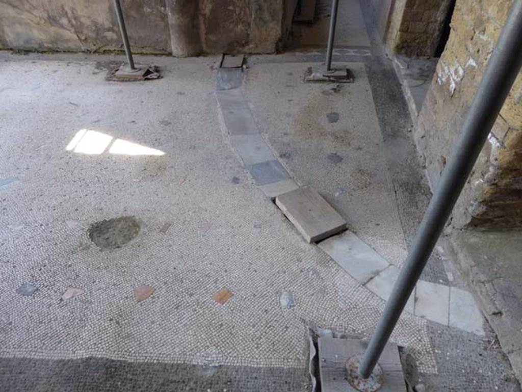 IV.2/1, Herculaneum, September 2016. Looking north from doorway in room 13, across east end of south portico, towards doorway to narrow corridor leading north along east side.  Photo courtesy of Michael Binns.

