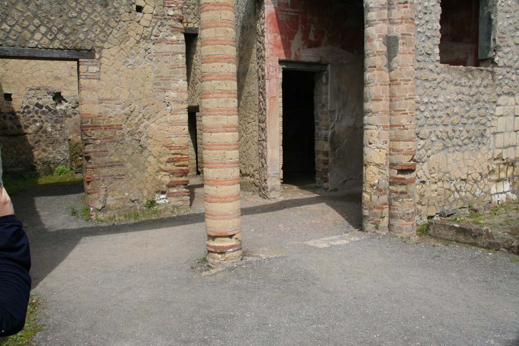 IV.4, Herculaneum, April 2013. Looking north-west from open courtyard 6, towards small courtyard 3, and towards doorway to room 4.
Photo courtesy of Klaus Heese.