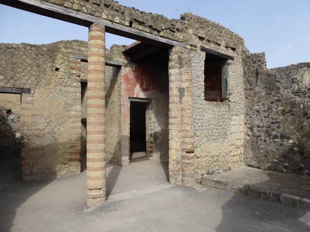 IV.4, Herculaneum, October 2014. Open courtyard 6, looking north-west towards doorway to room 4. Photo courtesy of Michael Binns.