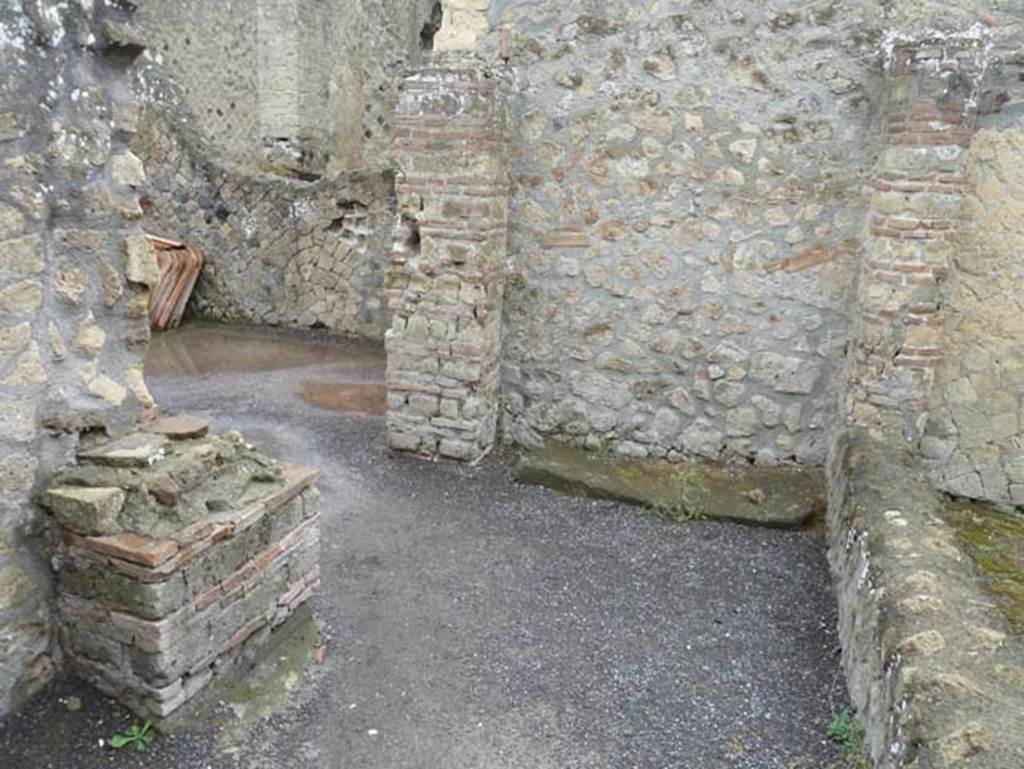 IV.4 Herculaneum. September 2015. Looking south towards doorway to the large triclinium 16, on east side of courtyard 12.
