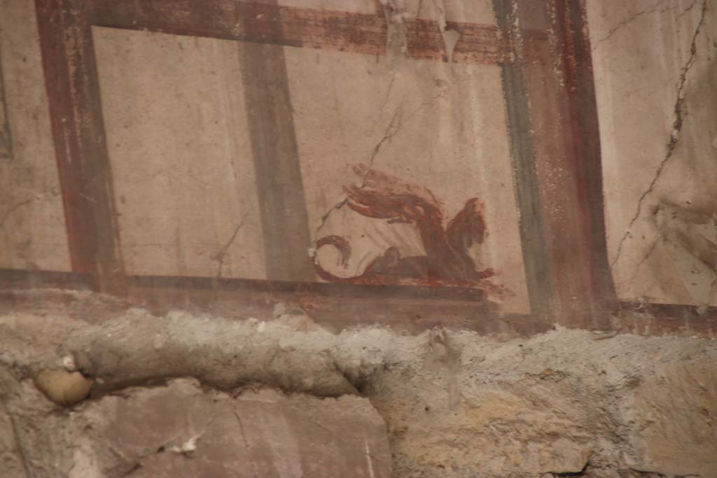 IV.4 Herculaneum. September 2017. Room 19, detail from upper west end of south wall of biclinium.
Photo courtesy of Klaus Heese.
