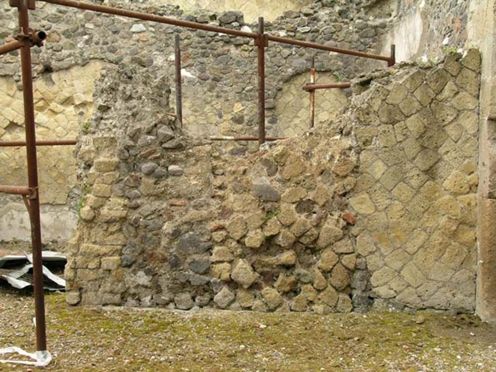 IV.6, Herculaneum, May 2005. Room 8, north wall of atrium in north-east corner, with doorway to room 9, on left. The doorway to room 10 is on the right. Photo courtesy of Nicolas Monteix.