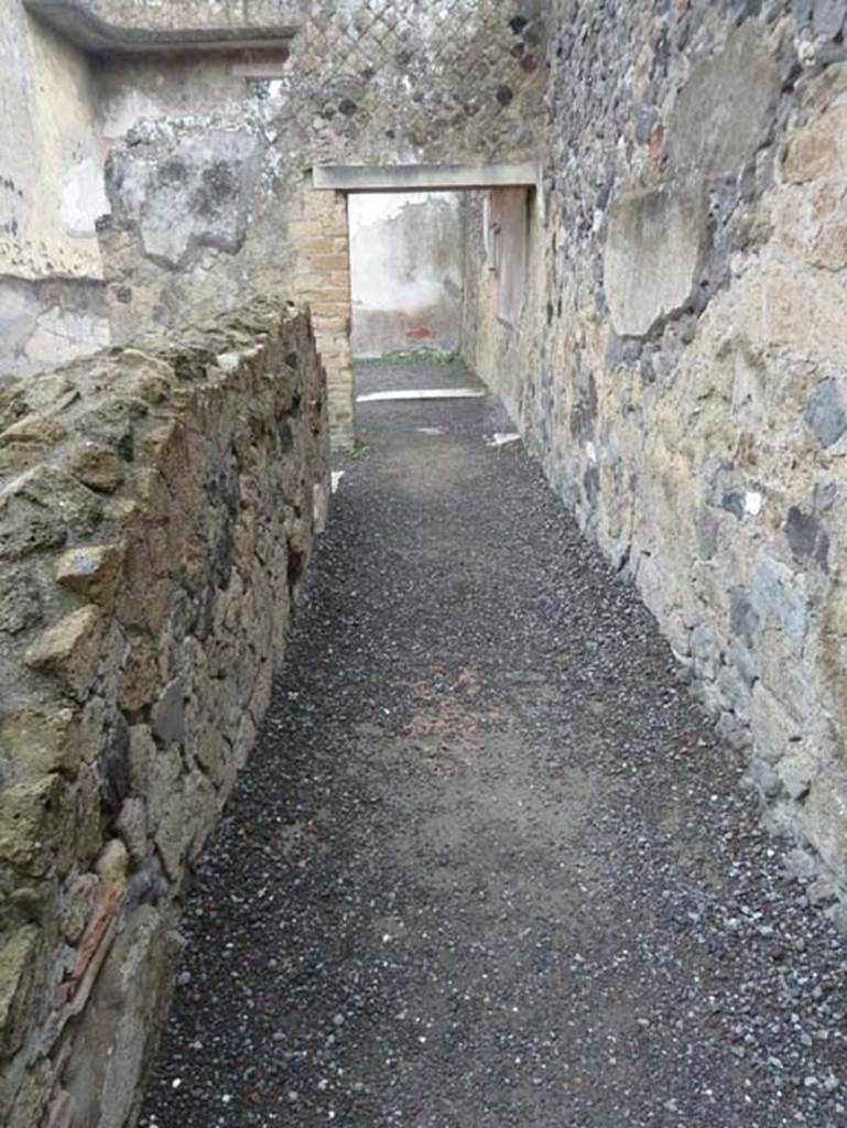 Ins. IV.8, Herculaneum, September 2015. Looking east along corridor from near room with small area attached.