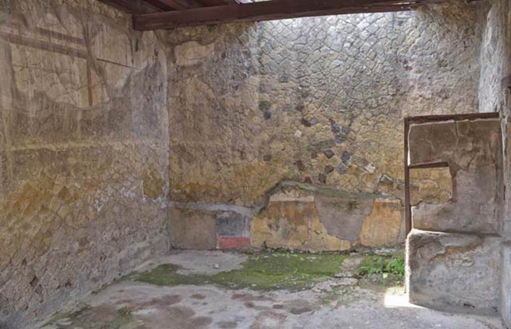 IV.14, Herculaneum, April 2018. Taberna vasaria with latrine at rear, on right. Photo courtesy of Ian Lycett-King.  Use is subject to Creative Commons Attribution-NonCommercial License v.4 International.
