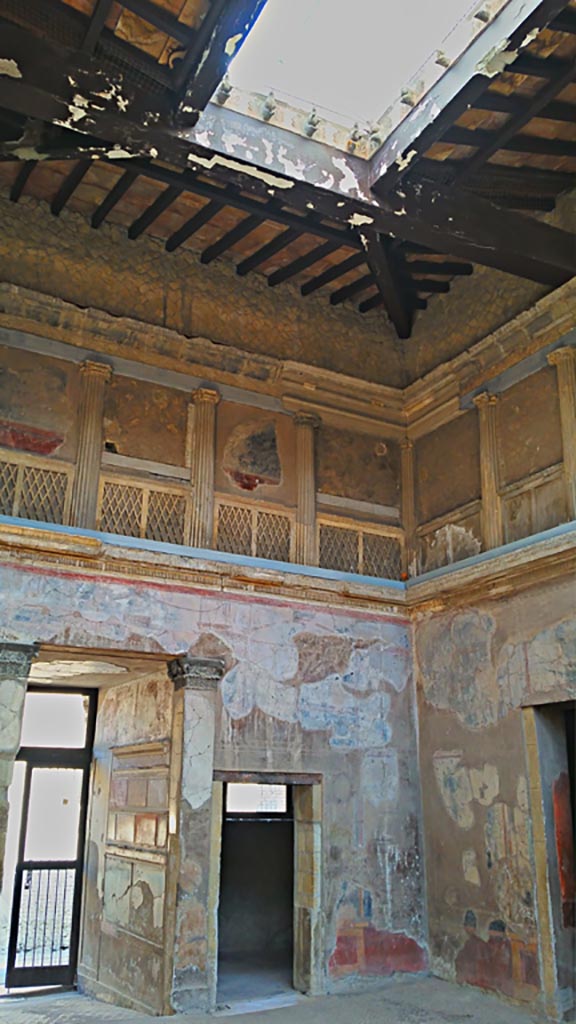 V.1 Herculaneum, photo taken between October 2014 and November 2019. 
Looking towards west wall and north-west corner of atrium, with compluvium in roof. 
Photo courtesy of Giuseppe Ciaramella.
