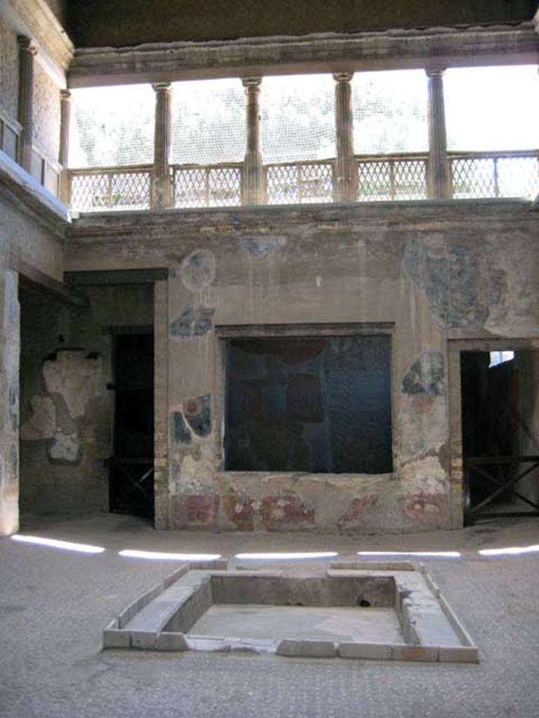 V.1 Herculaneum. June 2011. Looking east across impluvium in atrium beneath compluvium. 
Photo courtesy of Sera Baker.
