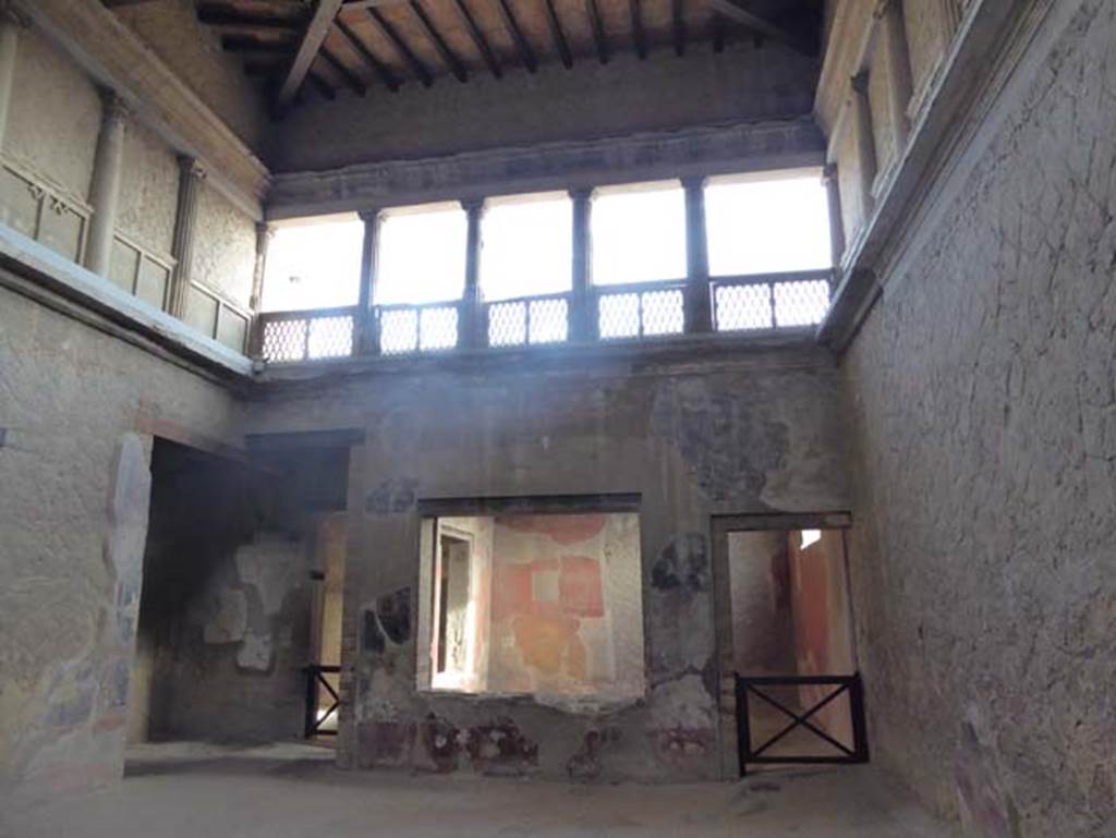 V.1, Herculaneum, October 2014. Looking towards the tablinum, room 6, on east side of atrium.  Photo courtesy of Michael Binns.
