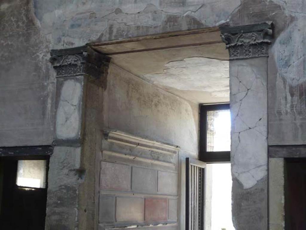 V.1 Herculaneum. August 2013. Capitals above entrance corridor, at west end of atrium.  Photo courtesy of Buzz Ferebee.
