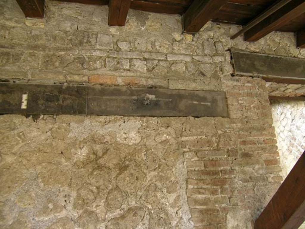 V.3-4, Herculaneum, May 2005. Exterior upper faade on north side of doorway to V.3.
Photo courtesy of Nicolas Monteix.
