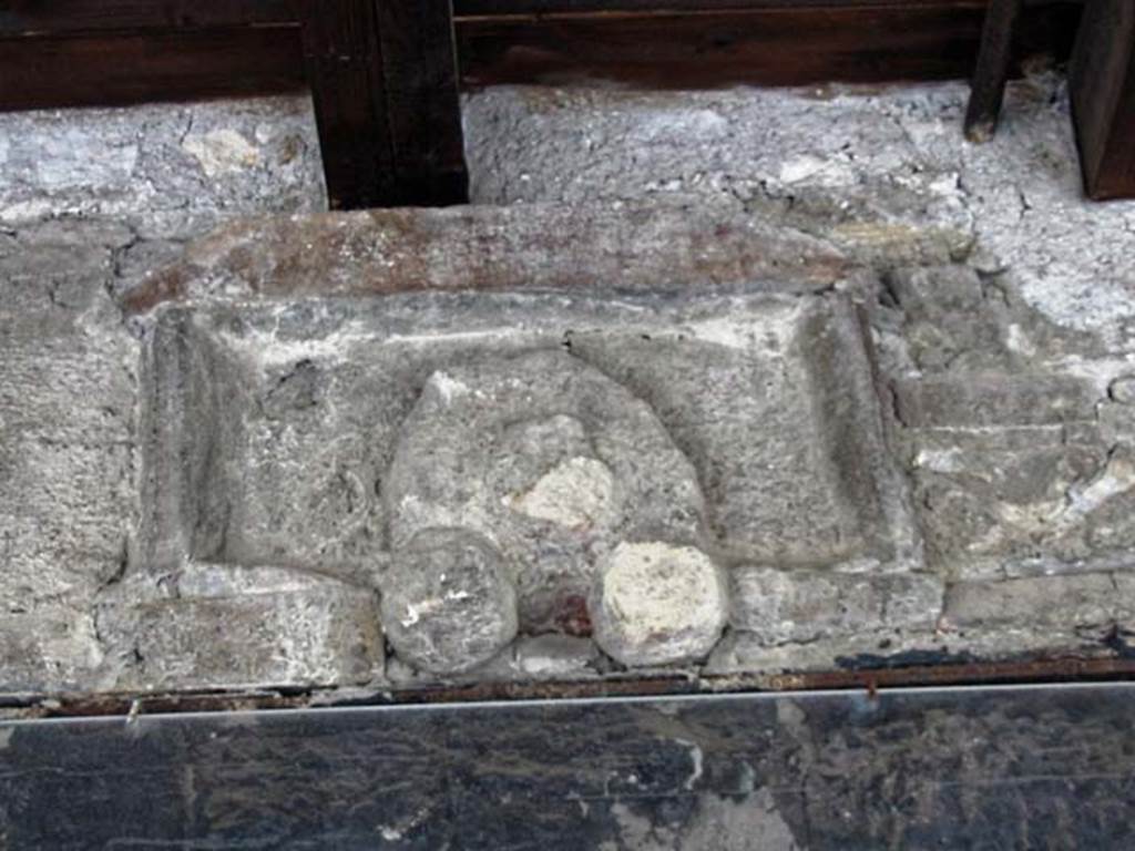 V.4, Herculaneum, May 2003. Plaque above doorway. Photo courtesy of Nicolas Monteix.