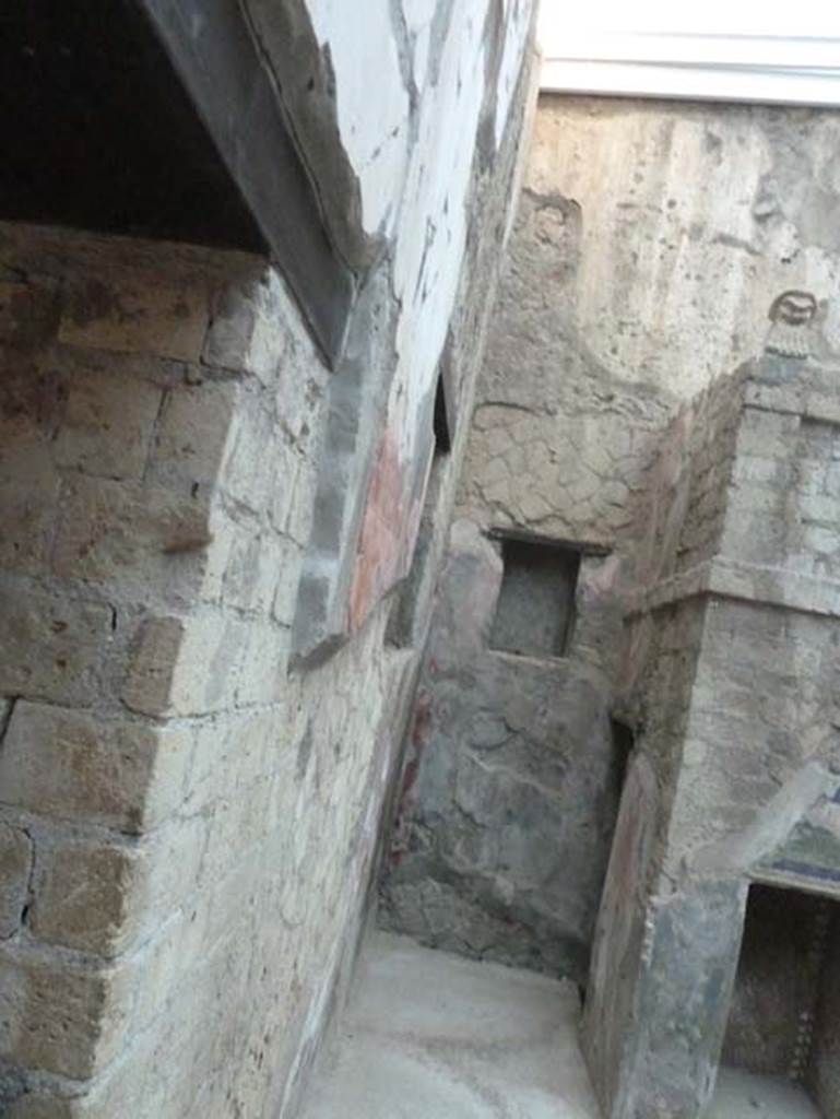 Ins. V 7, Herculaneum, September 2015. North end of west wall of internal courtyard, taken from window in tablinum. 