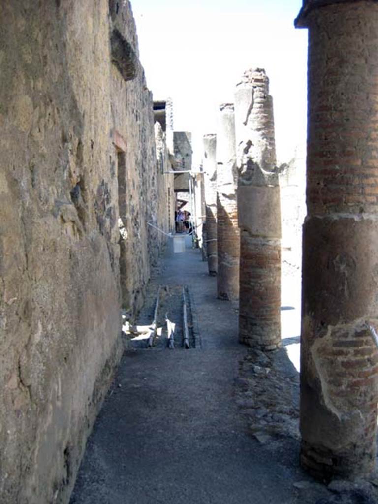 V, Herculaneum, June 2011. Doorway at V.9, on the left.
Looking south along Cardo IV Superiore, from junction with Decumanus Maximus.
Photo courtesy of Sera Baker.
