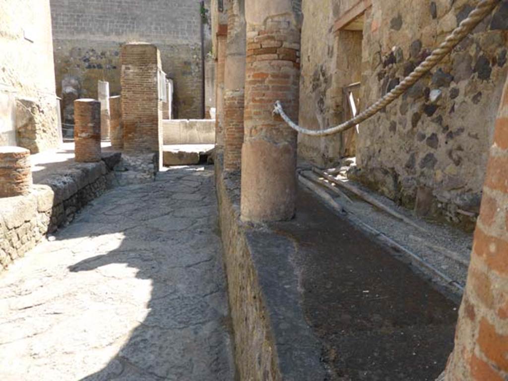 V.9 Herculaneum, on right. June 2014. North end of Cardo IV Superiore, looking north towards Decumanus Maximus. Photo courtesy of Michael Binns.