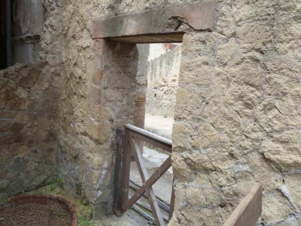 V. 10, Herculaneum, May 2010. Rear room, doorway at V.9 in west wall leading to Cardo IV Superiore. 