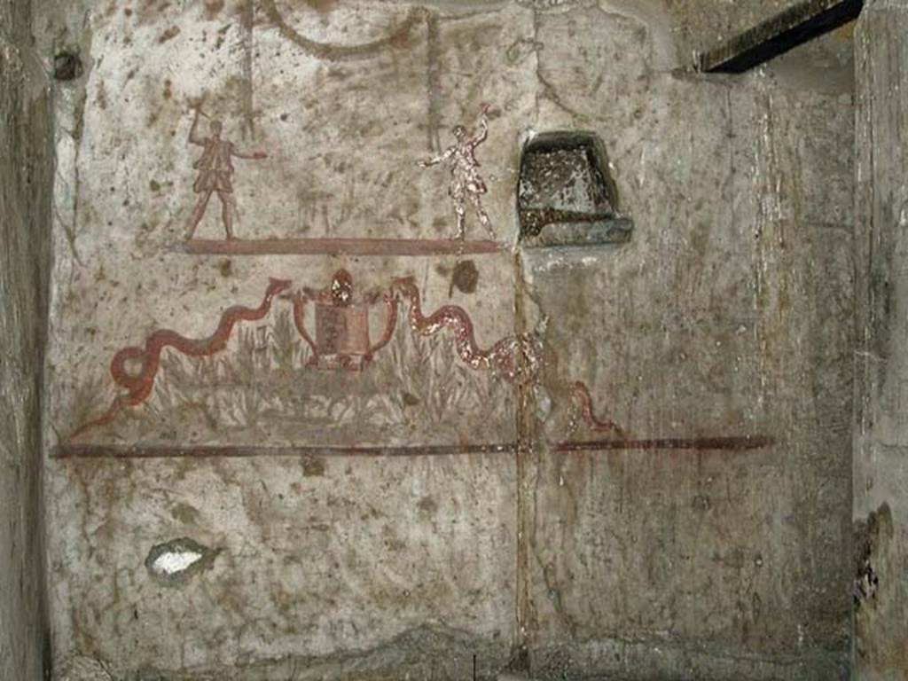 V.14, Herculaneum. September 2003. Detail of lararium on south wall of room 9.
Photo courtesy of Nicolas Monteix.