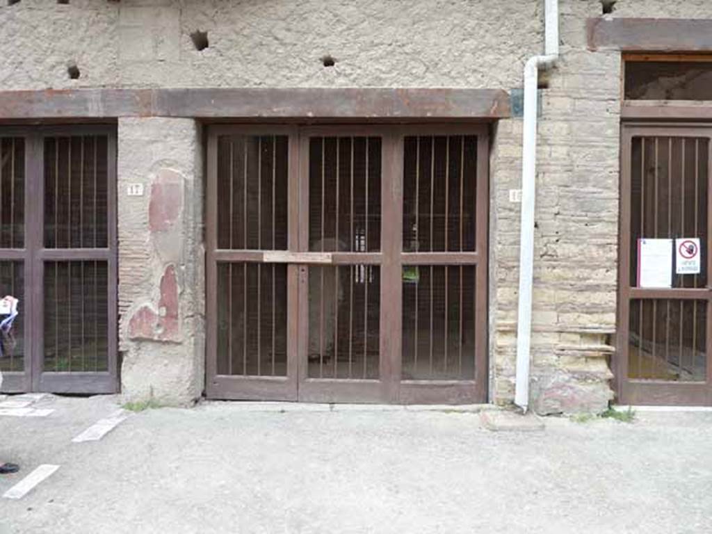 V 17, 16 in centre, and 15, Herculaneum, May 2010. Entrance doorways.