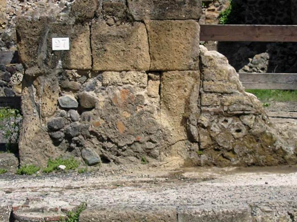 V.26, Herculaneum. May 2003. Street facade between doorway to V.27, on left, and V.26, on right. Photo courtesy of Nicolas Monteix.
