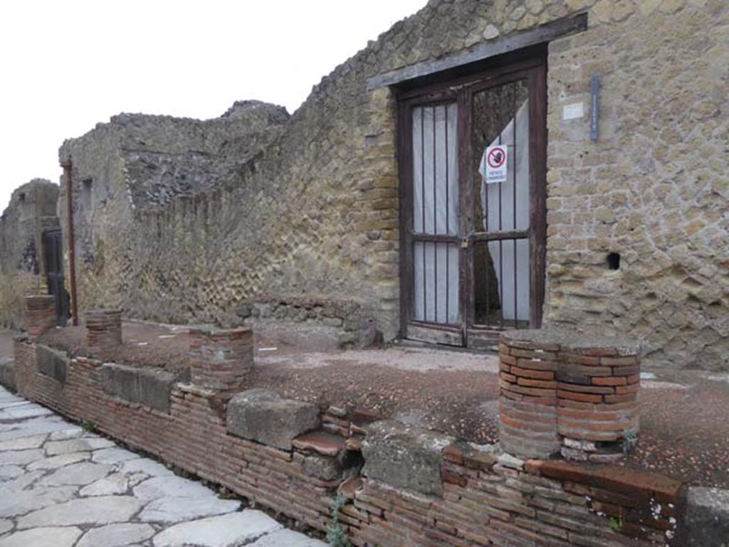 V.30 Herculaneum, October 2015. Looking towards entrance doorway on west side of Cardo V. Superiore. Photo courtesy of Michael Binns.