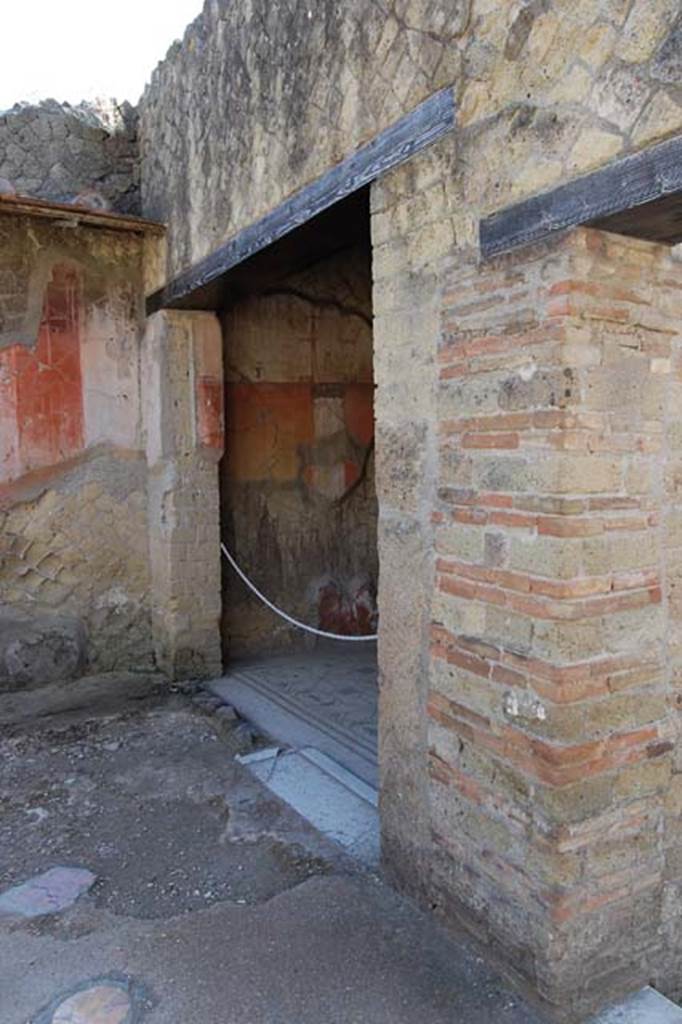 V.30 Herculaneum, May 2011.  
Looking towards north-east corner of atrium, with doorway to oecus (1) in the centre, and entrance doorway, on the right.
Photo courtesy of Nicolas Monteix. 
