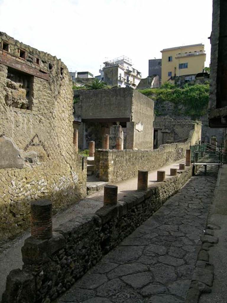 VI.11, Herculaneum. May 2004. Looking north-west on Cardo IV, towards entrance doorway.
Photo courtesy of Nicolas Monteix.