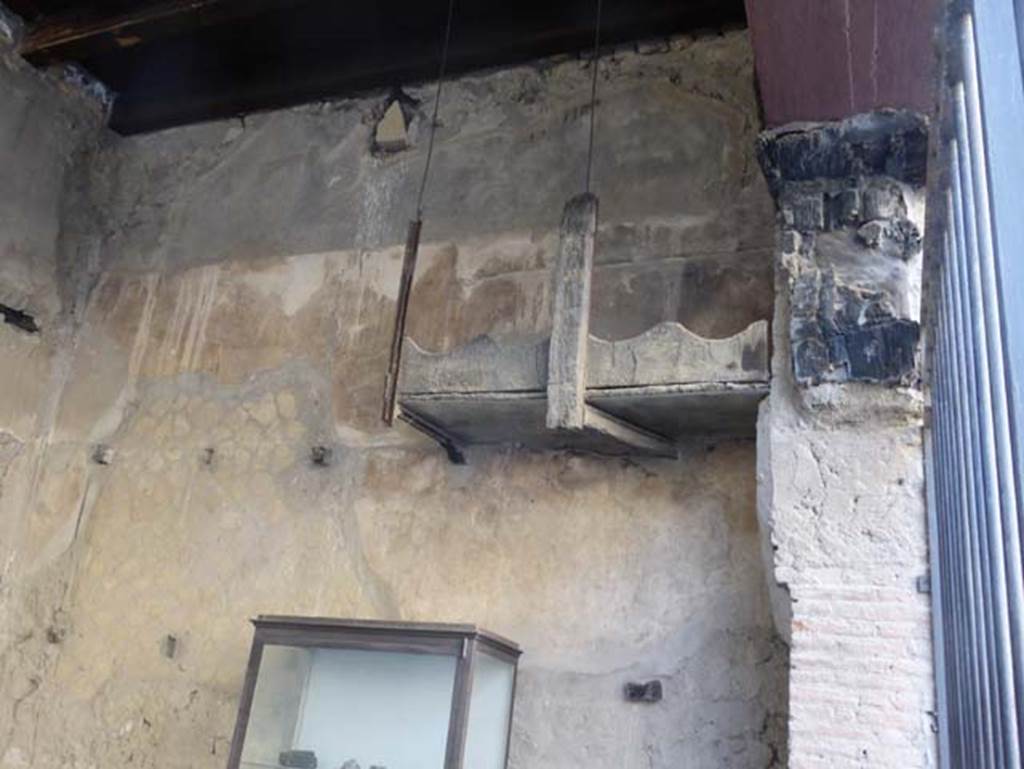 VI.12 Herculaneum, September 2015. West wall, against which is the still partly preserved shelving for storage or amphorae. 

