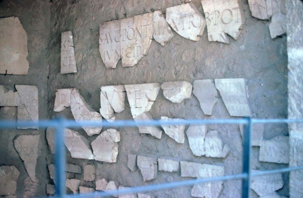 Fragments of inscription commemorating the reconstruction by Emperor Vespasian. Photo taken 7th August 1976.
Photo courtesy of Rick Bauer, from Dr George Fays slides collection.

