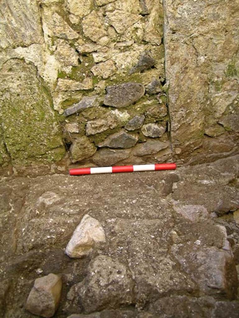 VI.25, Herculaneum. May 2004. Rear room, flooring near blocked window in west wall.
Photo courtesy of Nicolas Monteix.
