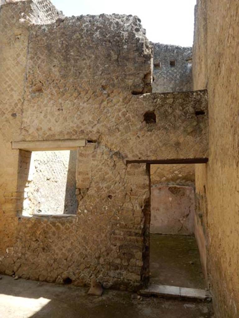 VI.29, Herculaneum. May 2018. Room 12, east wall with window and doorway into room 13. 
Photo courtesy of Buzz Ferebee.
