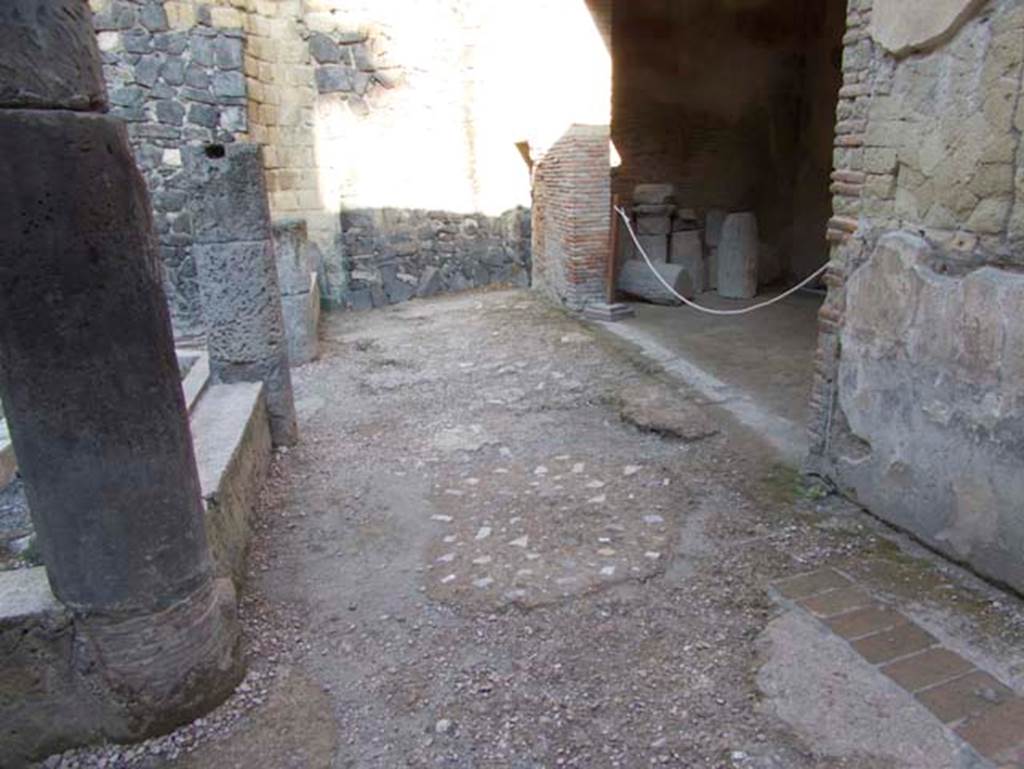 VII.2 Herculaneum. September 2015. Peristyle 10, looking north along east portico, with doorway to Exedra 11, on right.  Photo courtesy of Michael Binns.

