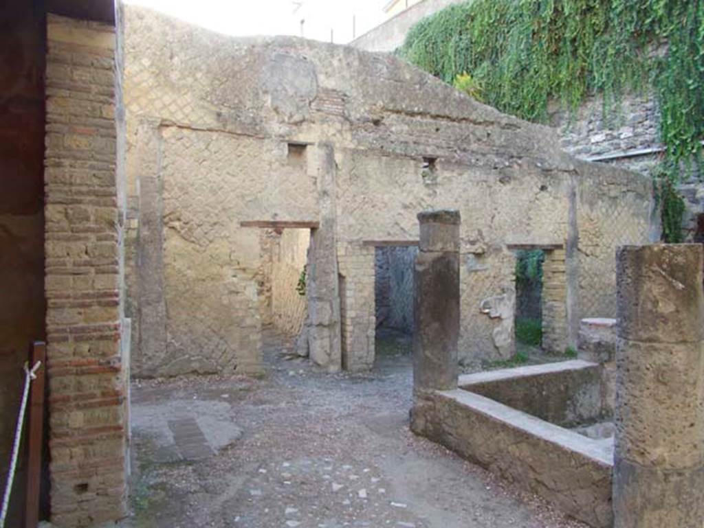 VII.2 Herculaneum. September 2015. Peristyle 10, looking south across east portico, towards doorways to rooms 6,7 and 8.  Photo courtesy of Michael Binns.
