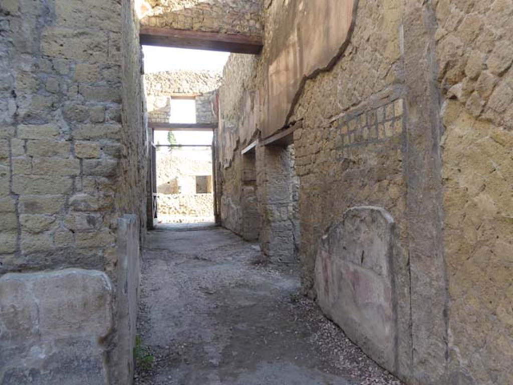 VII.2 Herculaneum. September 2015. Looking west along entrance corridor towards entrance doorway, from south end of east portico.  Photo courtesy of Michael Binns.

