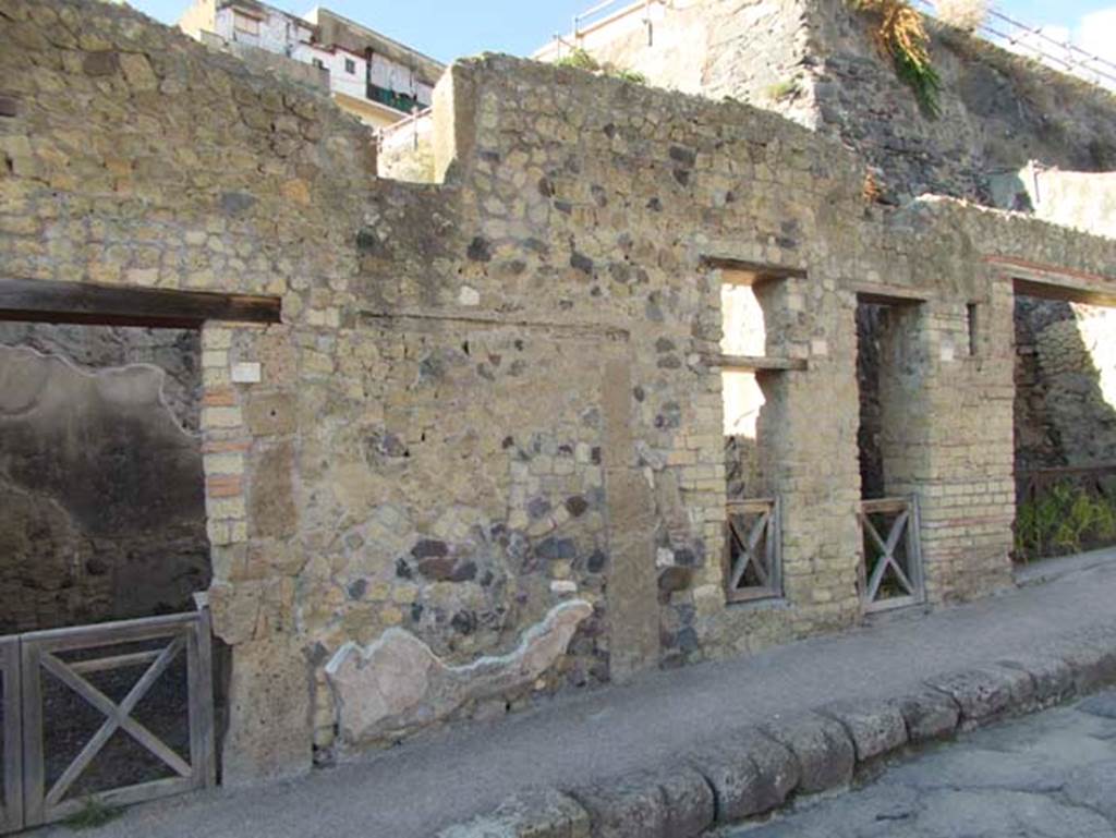 VII.4, on left, VII.5 and VII.6, Herculaneum. September 2015. Looking towards entrance doorways. Photo courtesy of Michael Binns.