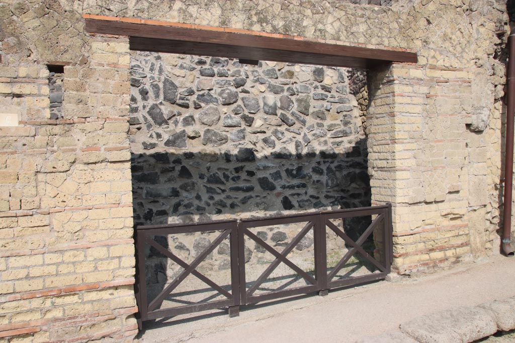 VII.7 Herculaneum. October 2023. Doorway on west side of Cardo III. Photo courtesy of Klaus Heese.