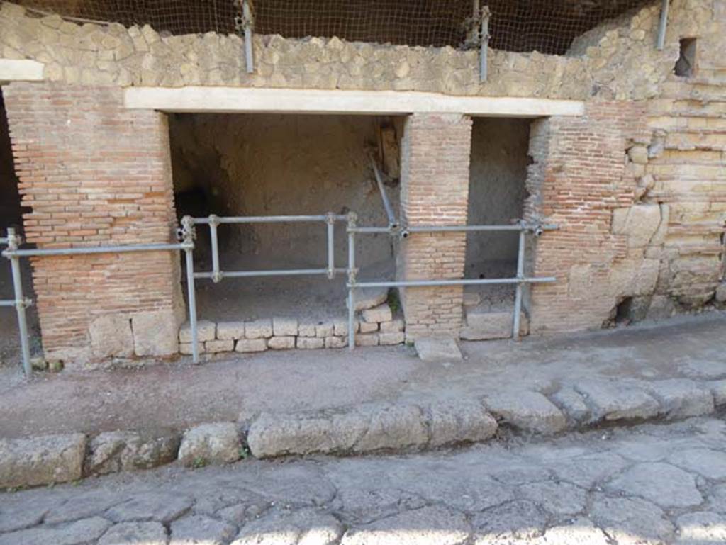 VII, 10 and 11, Herculaneum, September 2015. Two doorways on west side of Cardo III Superiore.  Photo courtesy of Michael Binns.
